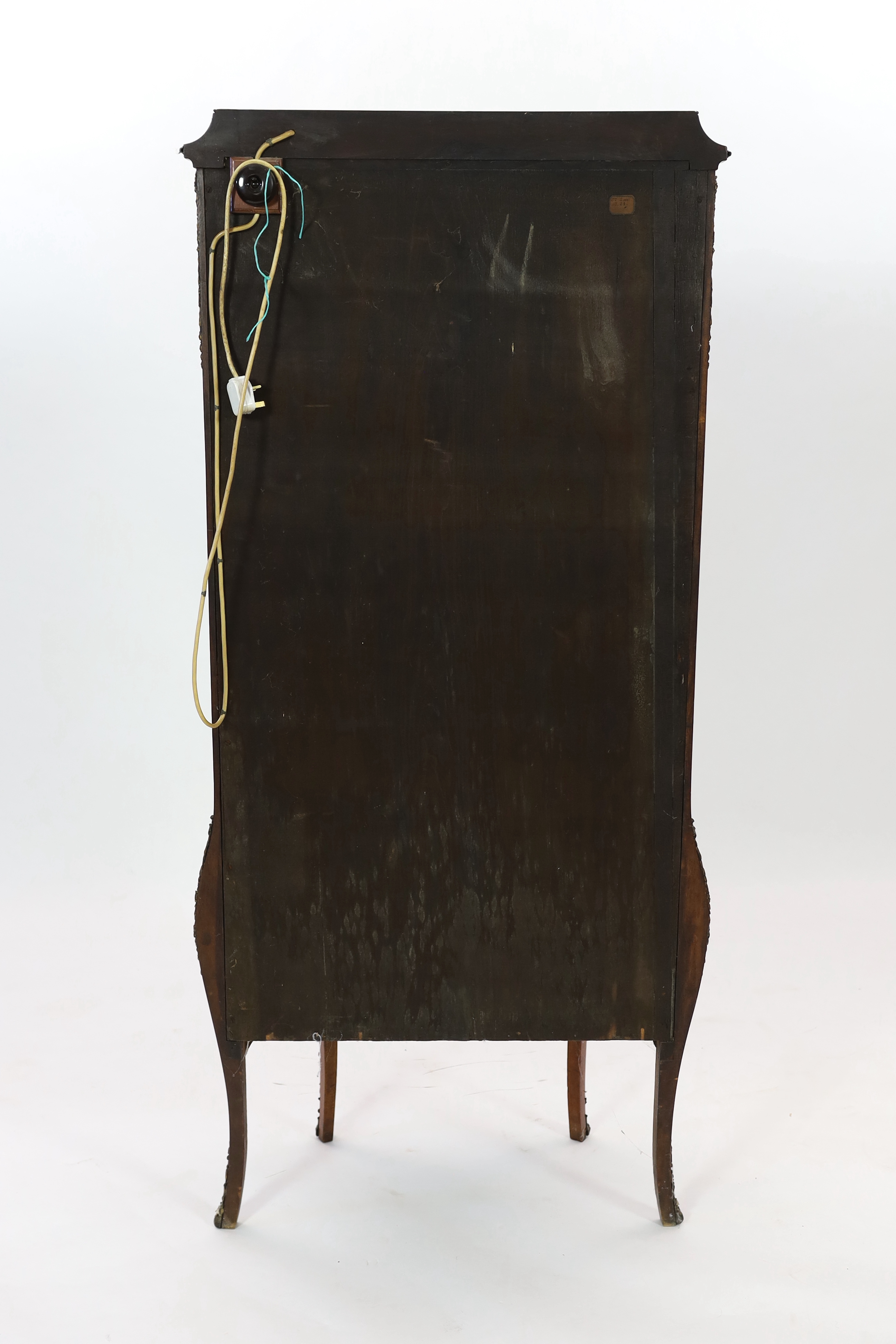 A French Vernis Martin style walnut vitrine, of bombé form with ormolu mounts, three quarter glazed door, lower panels, painted with scenes after Boucher and signed 'Albertine', on cabriole legs, 78cm wide, 42cm deep, 17